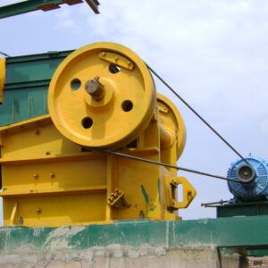A powerful Jaw Crusher in action, efficiently crushing various materials for construction and mining applications. This robust equipment ensures reliable performance, reducing downtime and increasing productivity for clients. Its cost-effective design maximizes efficiency without compromising quality, making it an ideal solution for those seeking budget-friendly and high-performance crushing solutions.