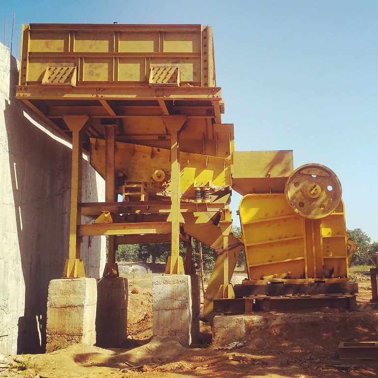 Civil Mounted stone crushing plant with powerful crushers, screening and conveyor systems processing stones for construction purposes